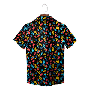 Indigo Hawaiian shirt with scattered colorful handprints on hanger variant 7
